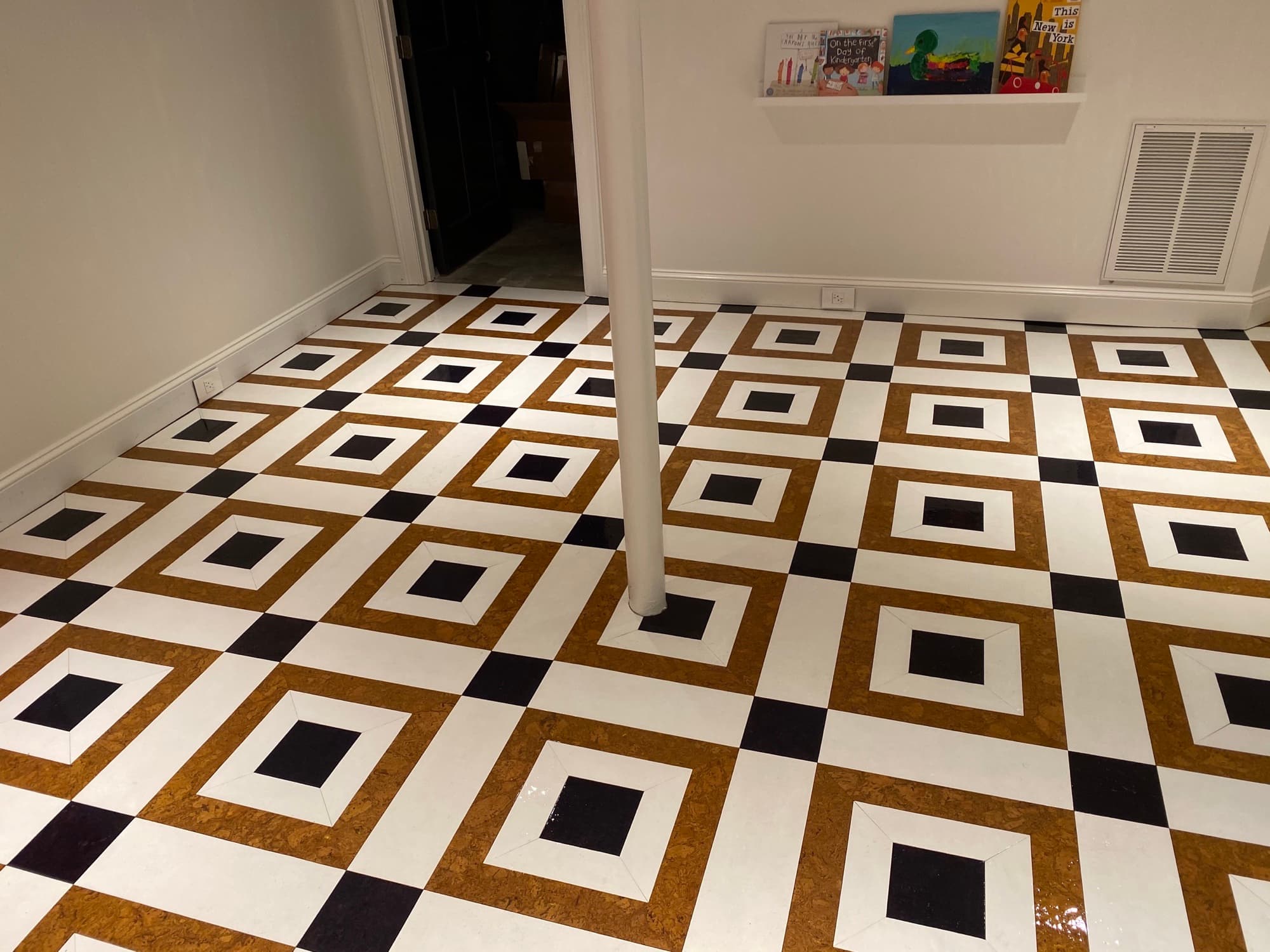 Custom patterned floor installation with geometric design by 12th And Oak Floor Co. serving Raleigh NC