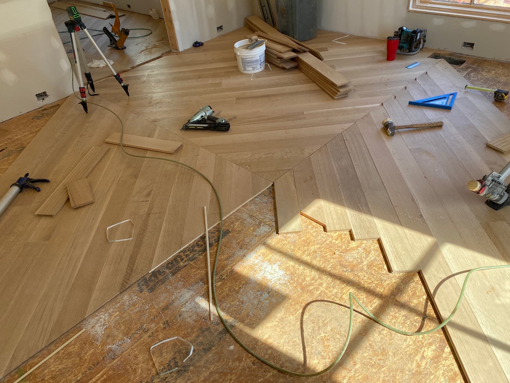White oak hardwood installation in progress on a Clayton, NC job