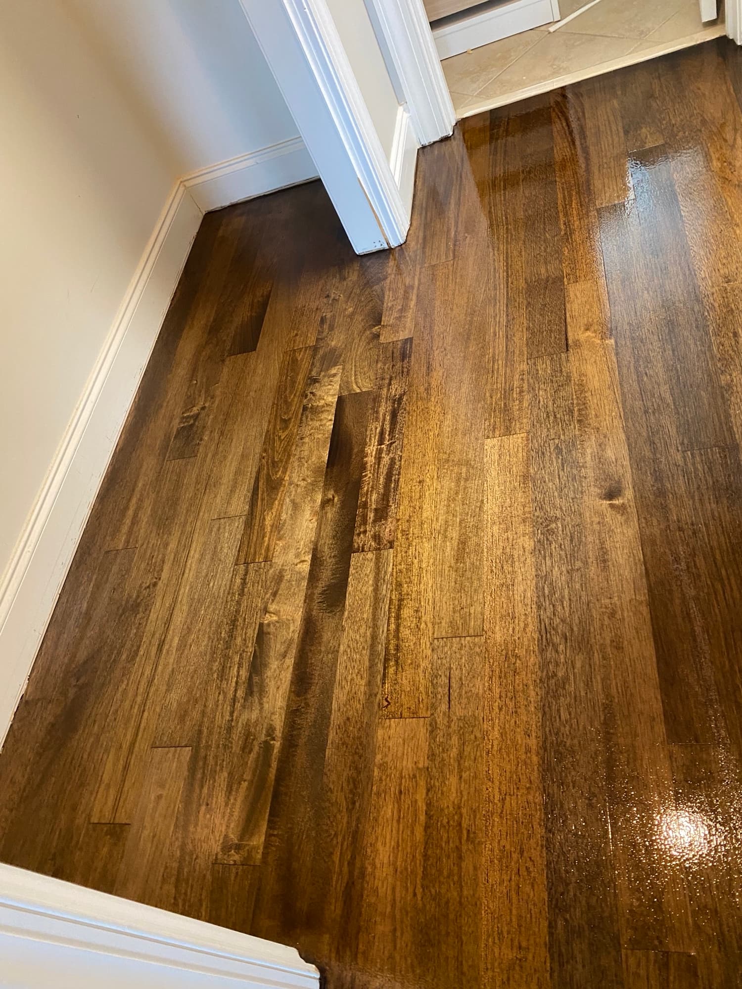 Wet finish coat of Bona Traffic HD on refinished Brazilian oak floor in Cary NC