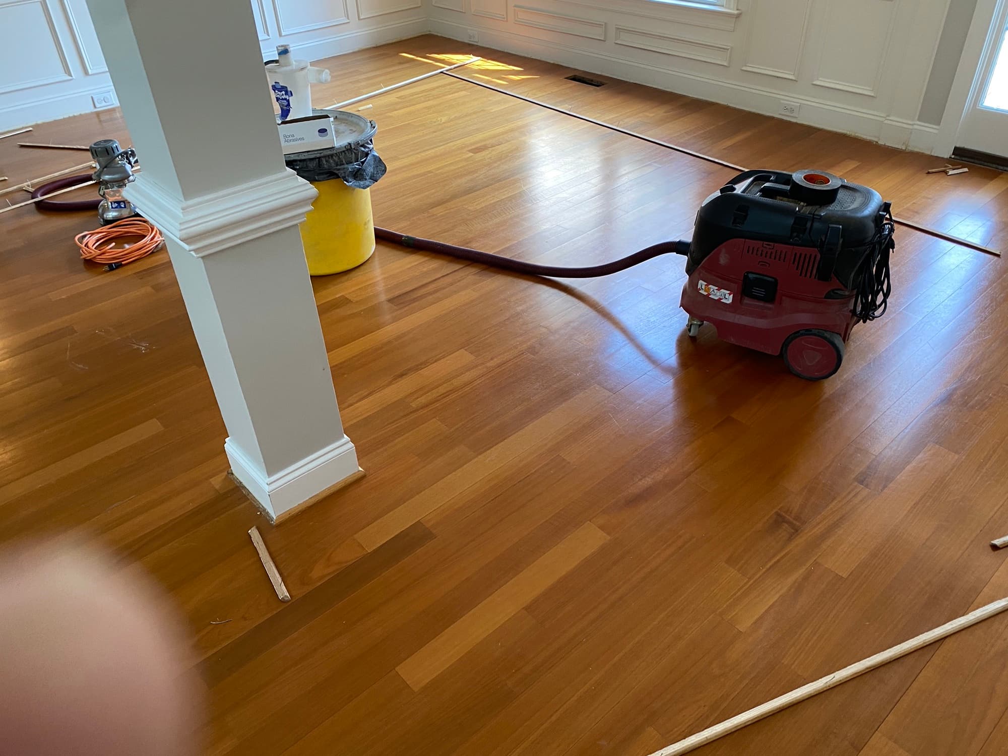 Job staging for Brazilian oak floor repair in McGregor Downs Cary NC