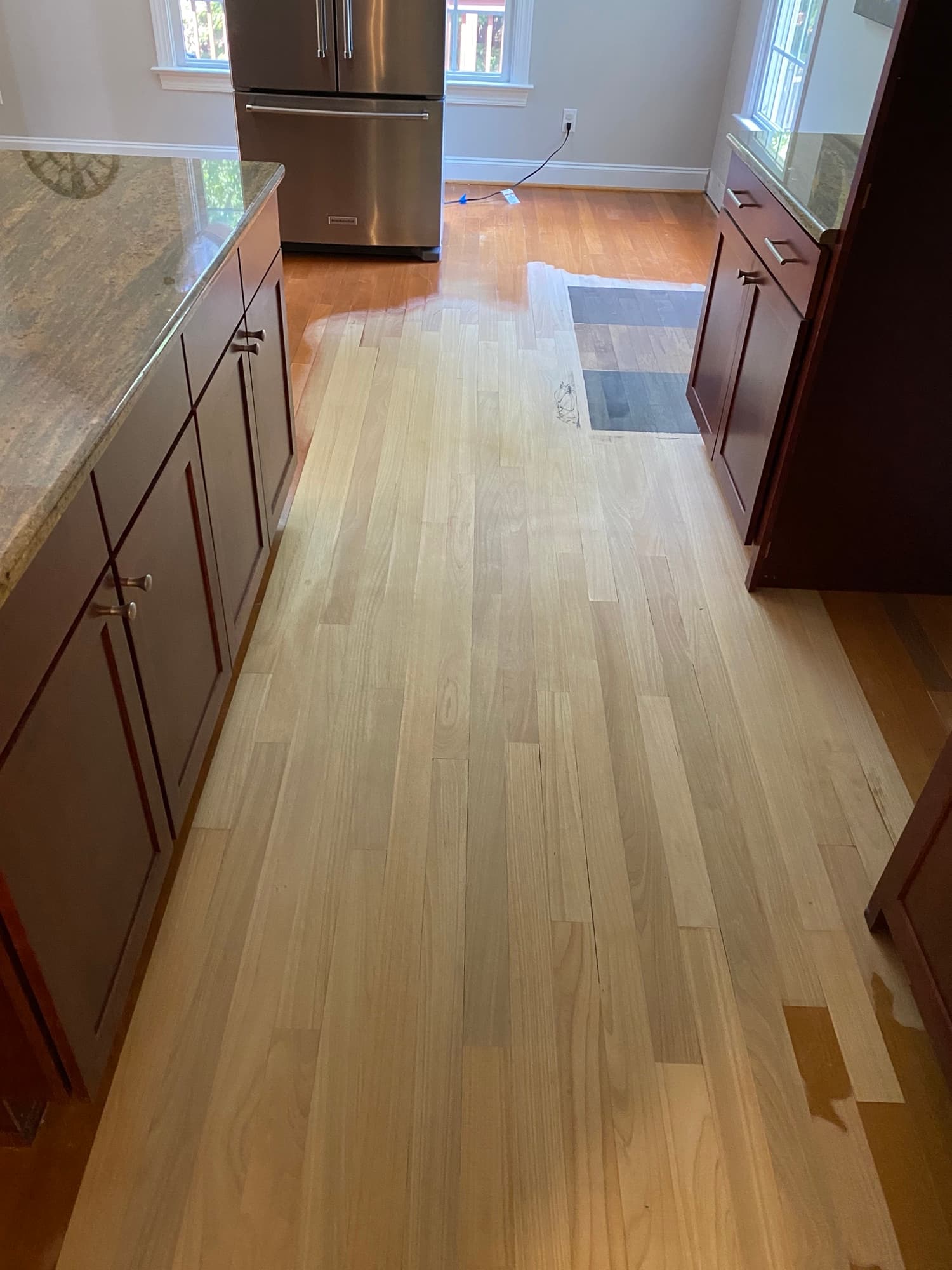 Repair area sanded and blended into existing Brazilian oak floor in McGregor Downs Cary NC