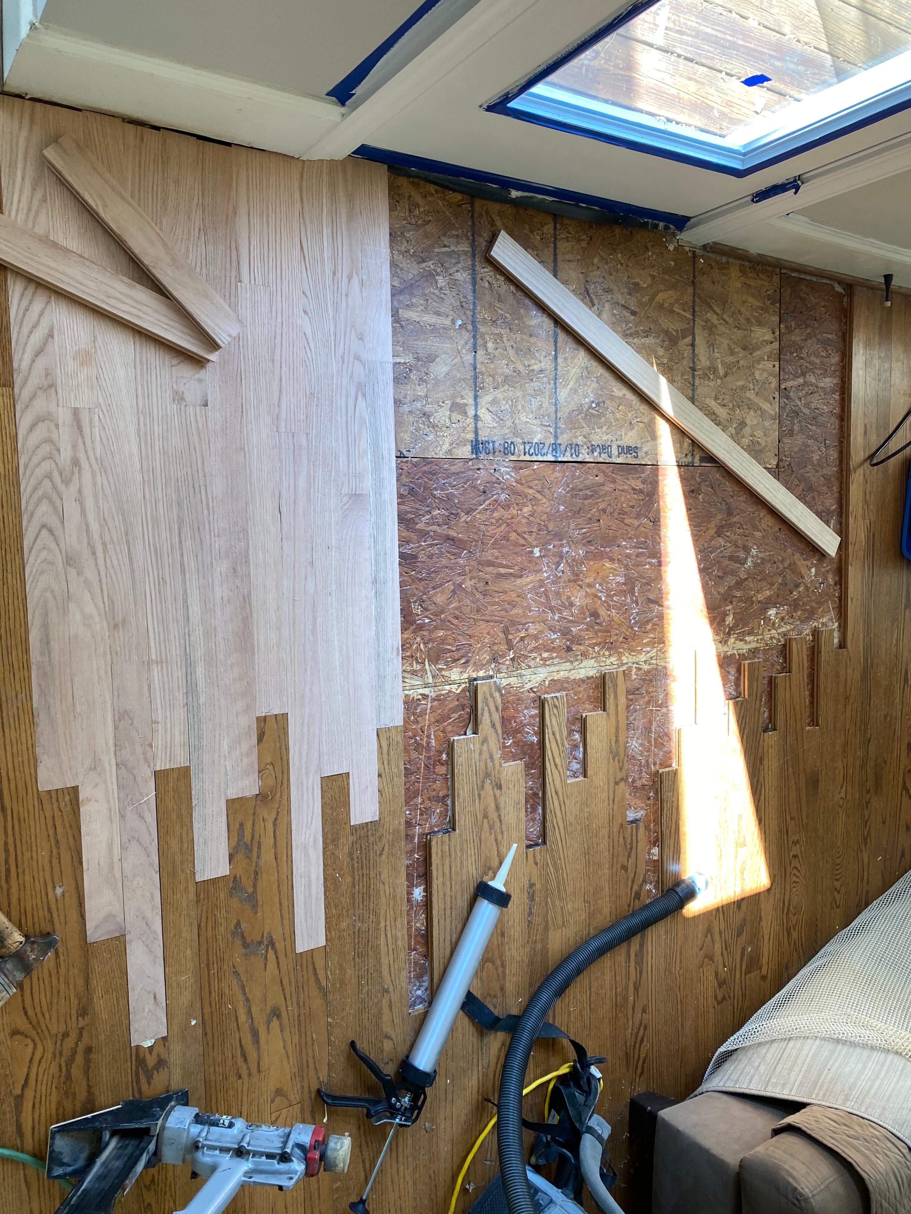 New 3.25 inch red oak installation in progress at repair area in Hocutt Farm Clayton NC Flowers Plantation