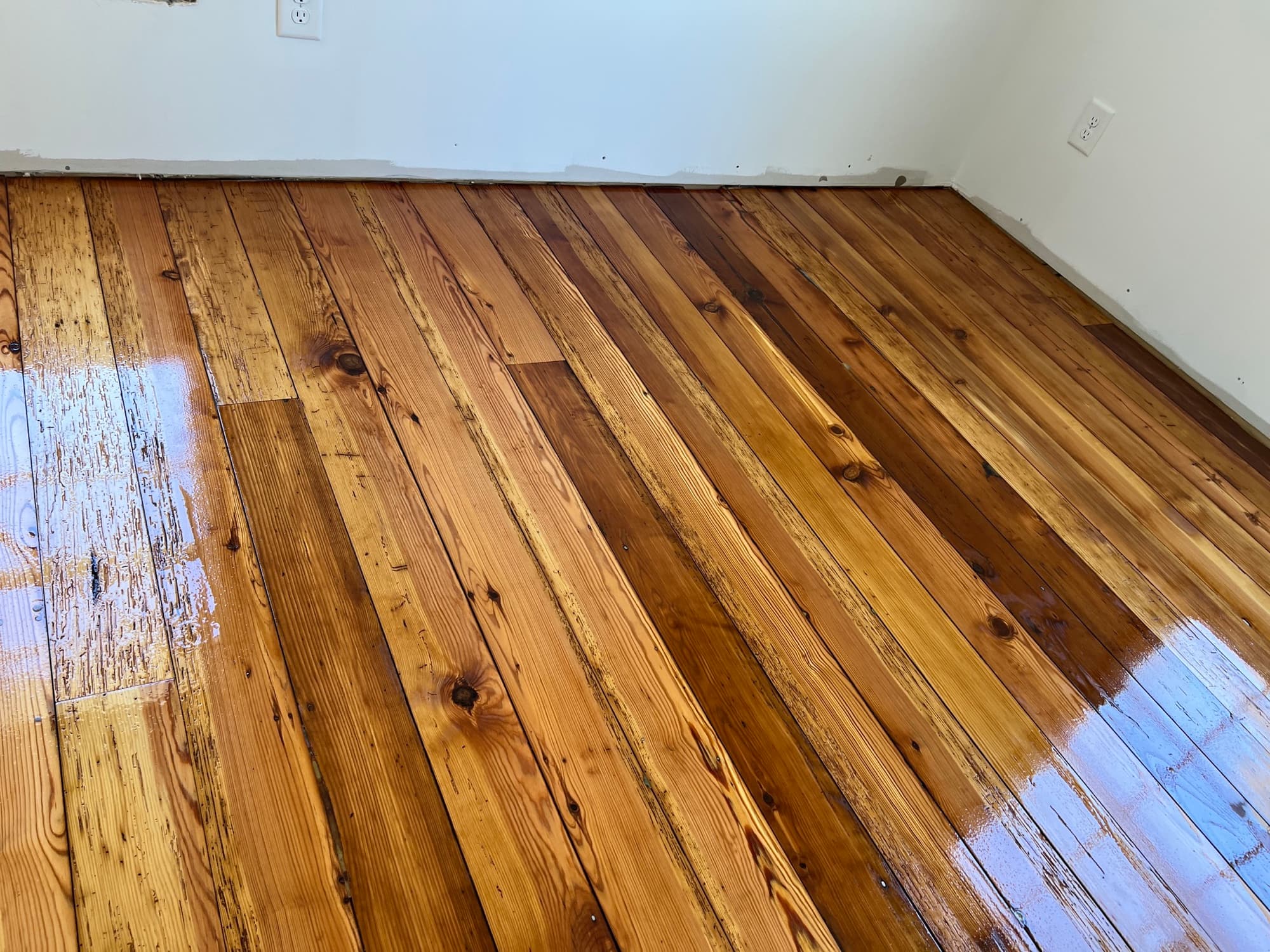 Refinished historic antique heart pine floor in Morrisville NC, old-growth longleaf pine much denser than modern yellow pine