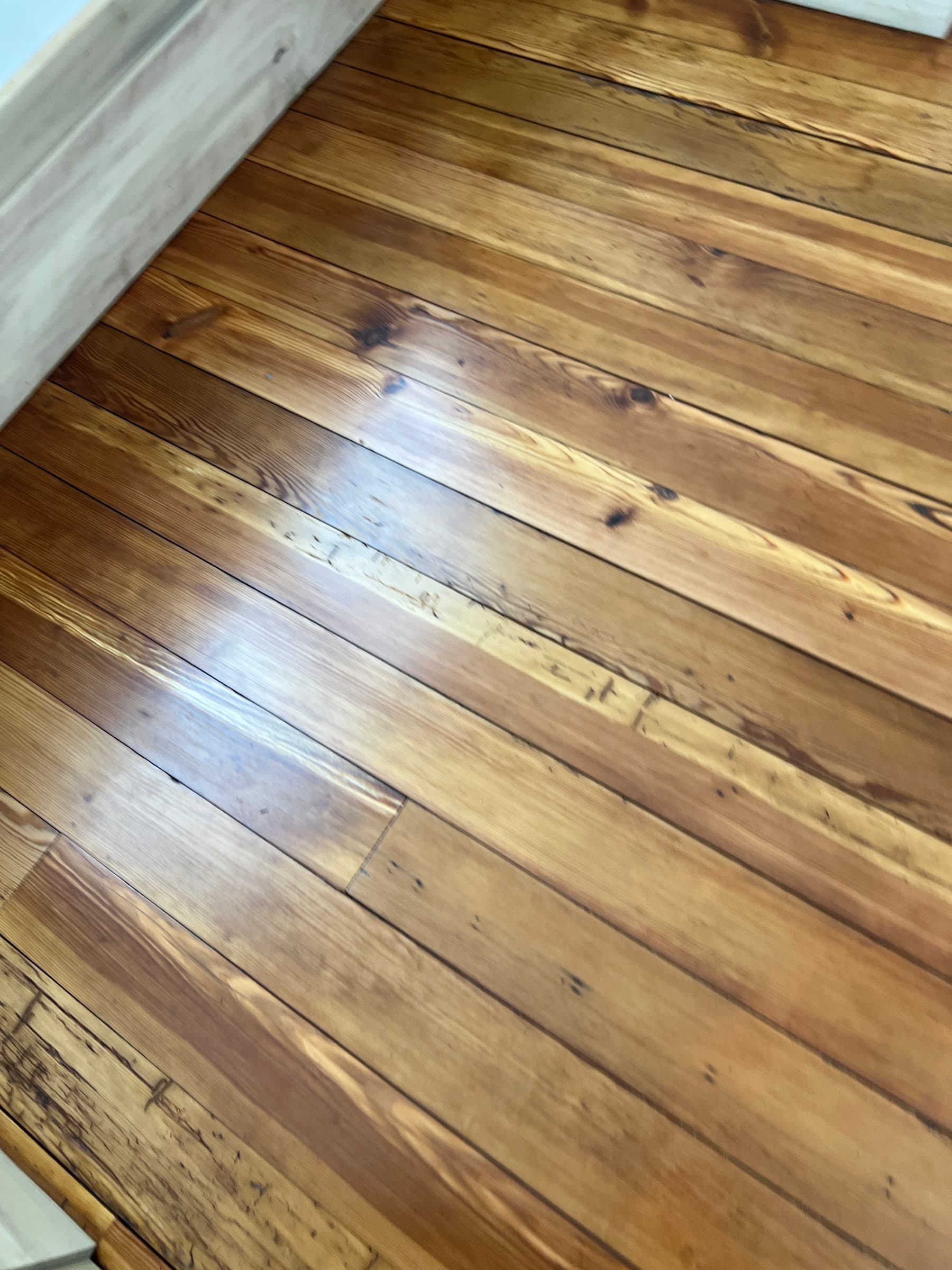 Historic heart pine hardwood floor refinished with tinted water-based finish in Morrisville NC