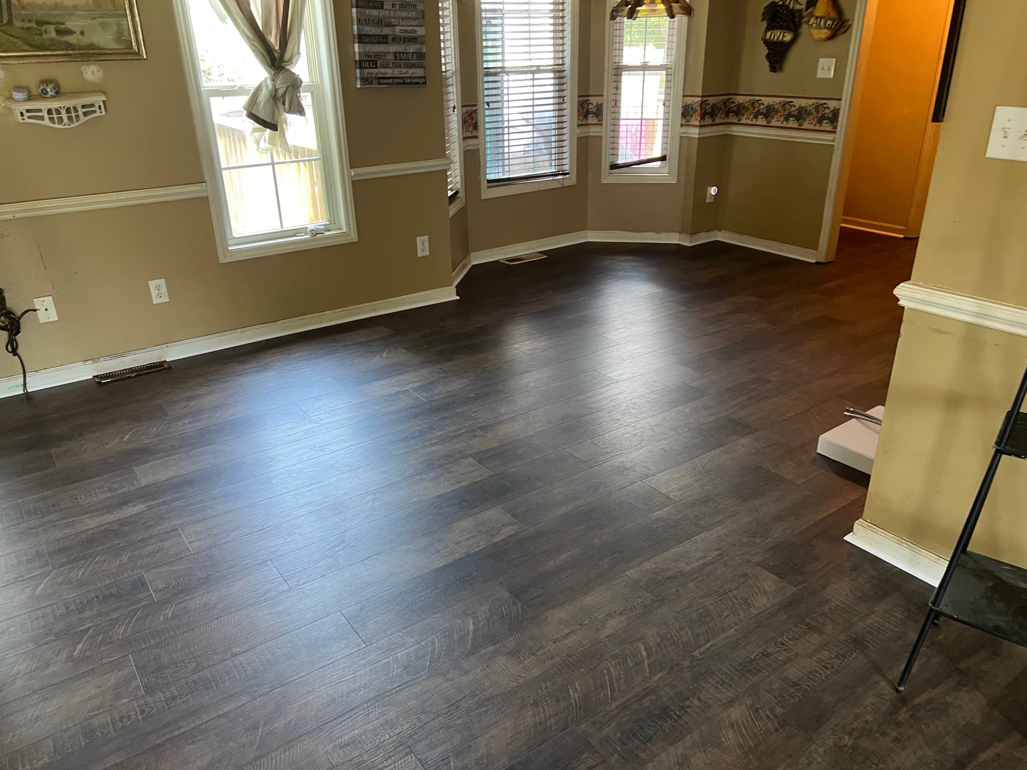 Finished Choice Flooring SPC Vineyard Collection Wine Barrel in family room after full-home LVP installation in Buffalo Creek Zebulon NC