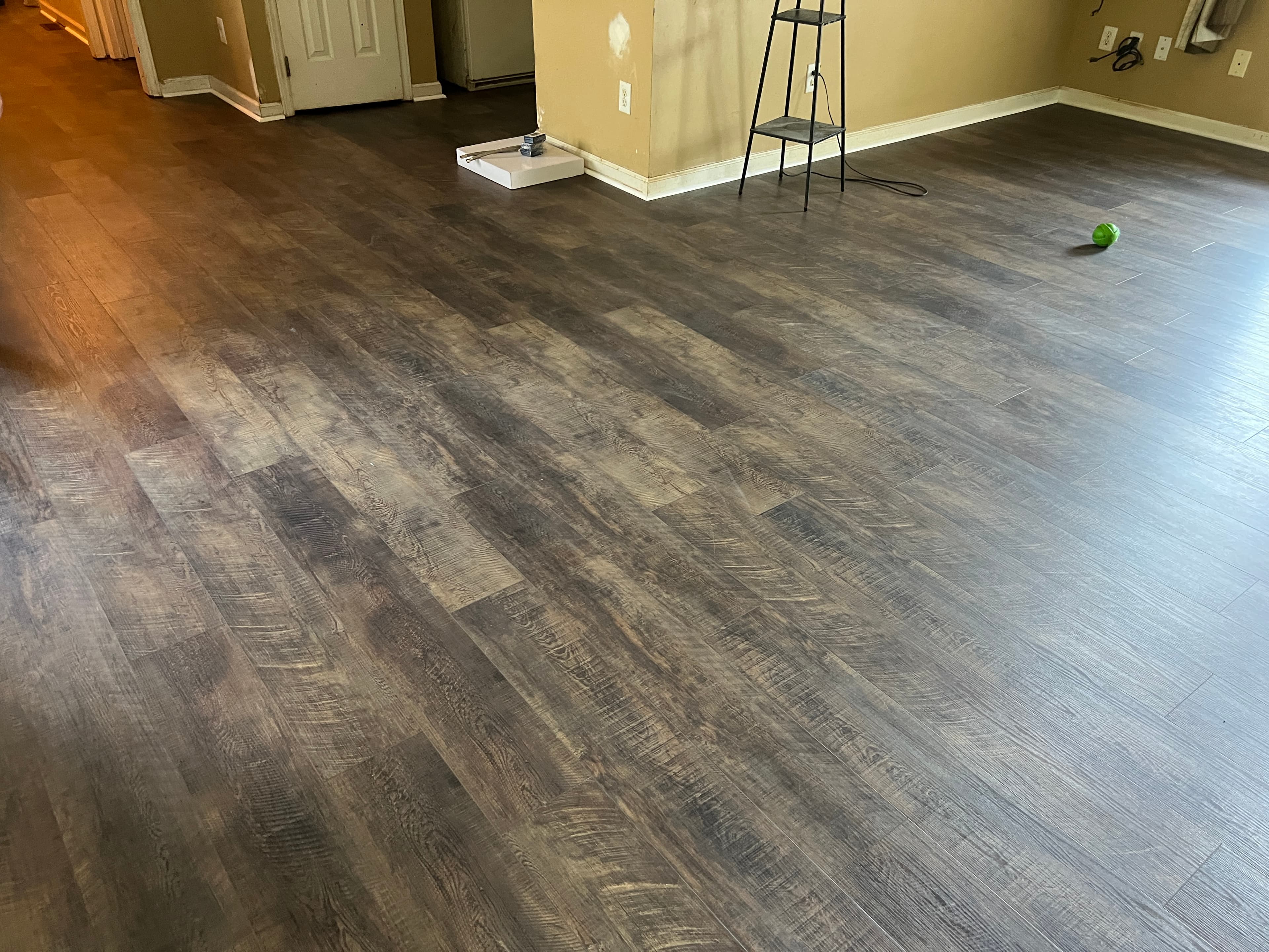 Finished SPC LVP Vineyard Collection Wine Barrel throughout Buffalo Creek Zebulon NC home, full installation complete