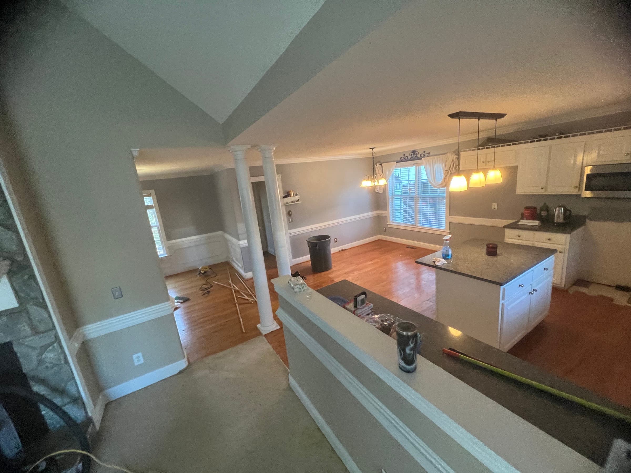 Overhead view of Winston Plantation Clayton NC home before LVP installation, carpet in living areas and existing hardwood in dining room