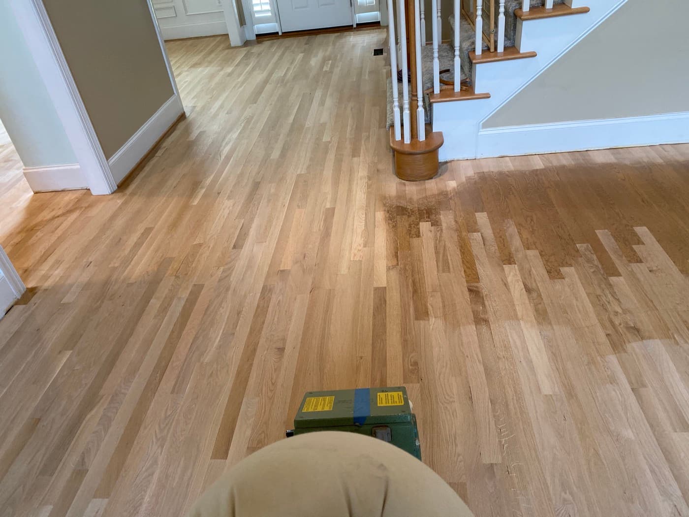 Large living room red oak hardwood floor sanding in progress in Glen Laurel Clayton NC