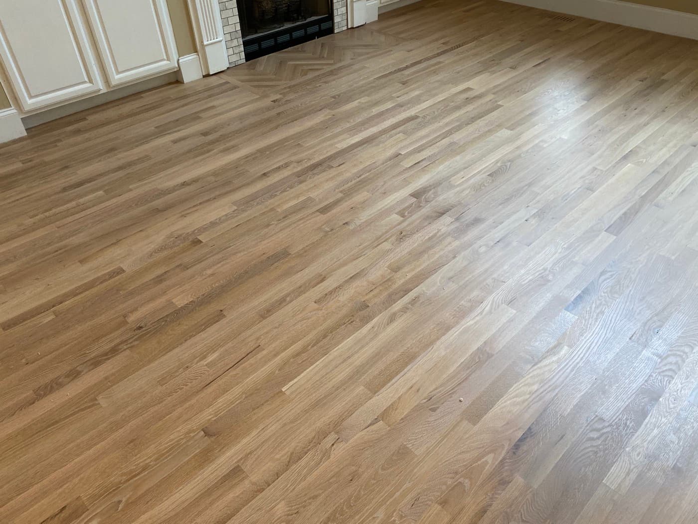 Finished red oak hardwood floors with natural hardwax oil in living room Glen Laurel Clayton NC