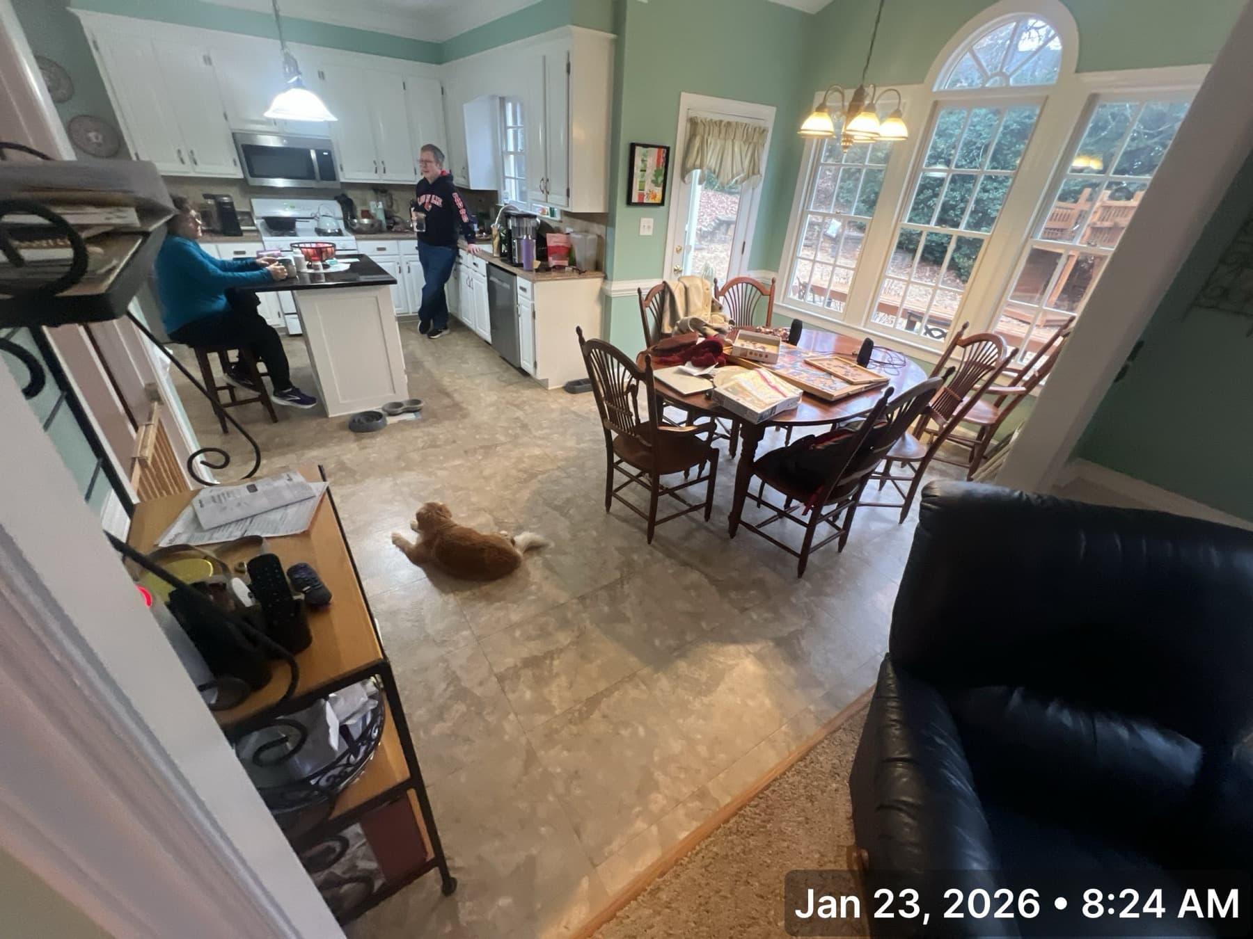 Kitchen before hardwood installation, vinyl tile floor in Umstead Ridge Raleigh NC