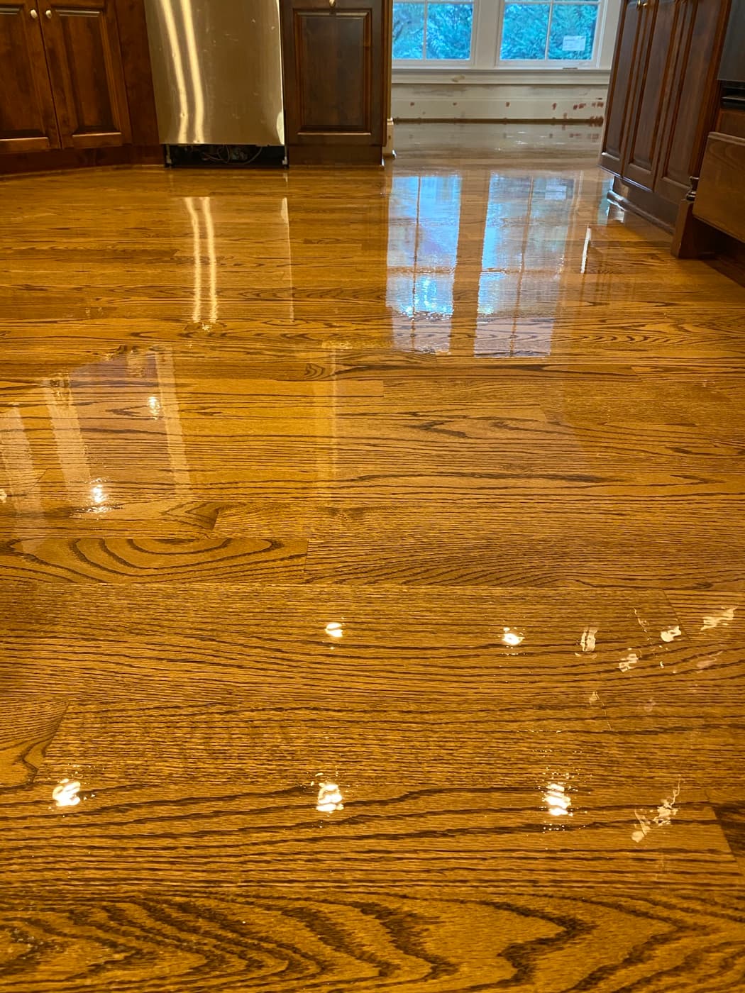 Close-up of finished 3.25-inch red oak grain with DuraSeal Special Walnut stain and Bona Traffic HD finish in Crabtree Heights Raleigh NC