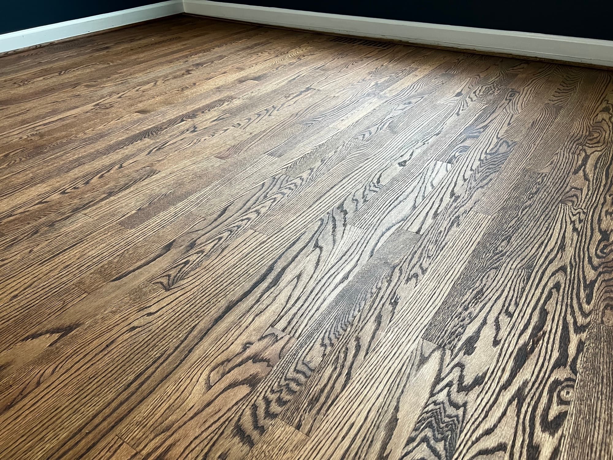 Wide view of completed red oak hardwood installation with Rubio Monocoat in downtown Smithfield NC