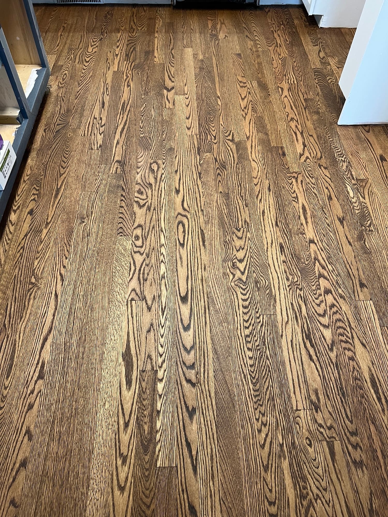 Completed red oak floor installation with lace-in work and Rubio Monocoat finish in downtown Smithfield NC