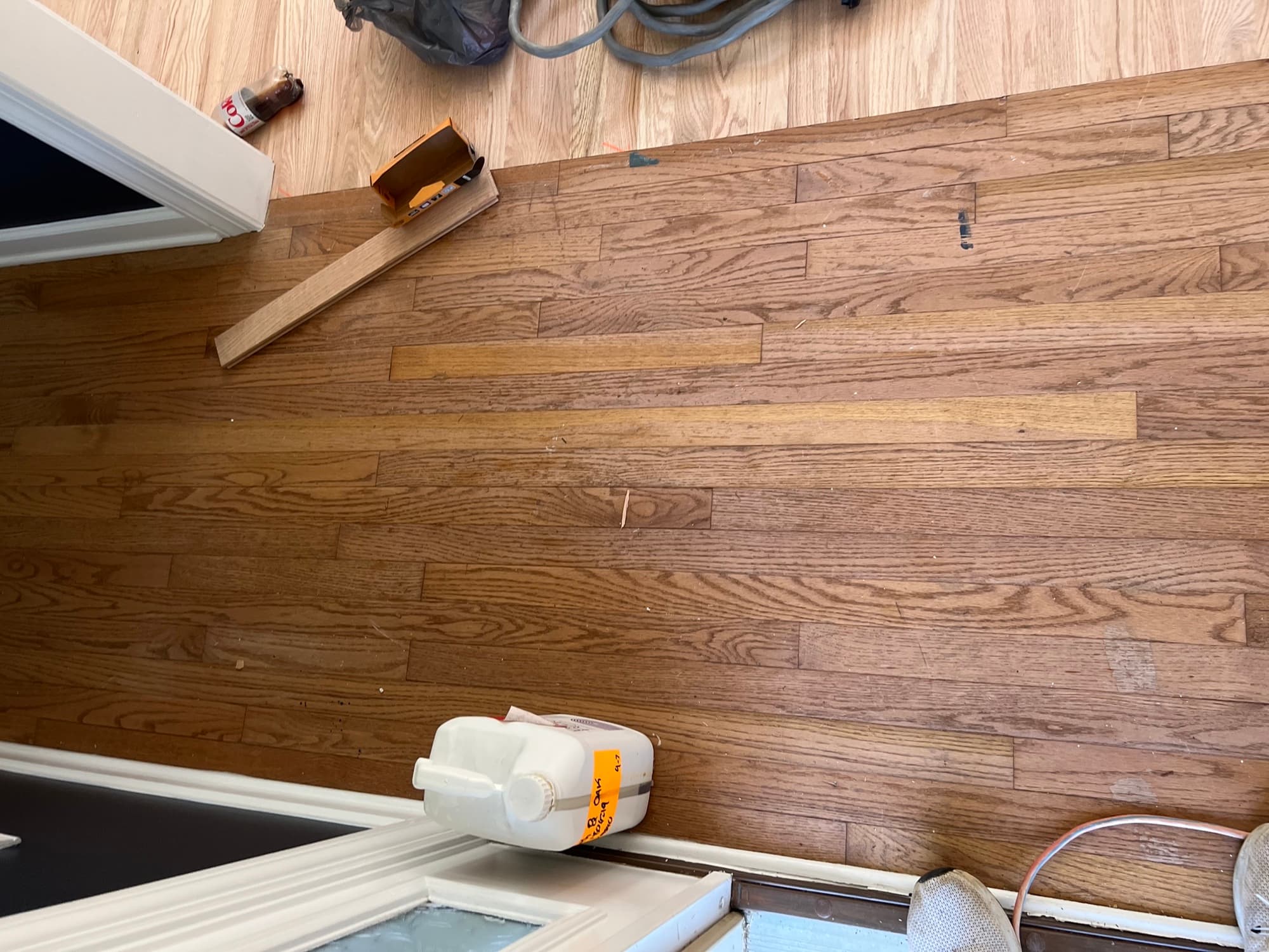 Worn and damaged existing hardwood floors with carpet in downtown Smithfield NC home before installation