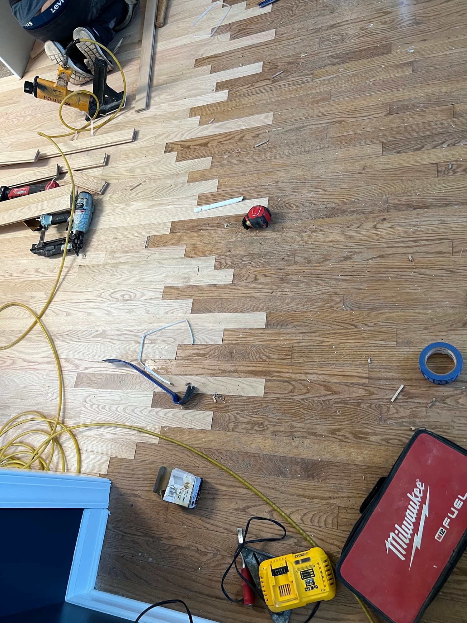 Red oak lace-in work tying new boards into existing hardwood floor in Smithfield NC