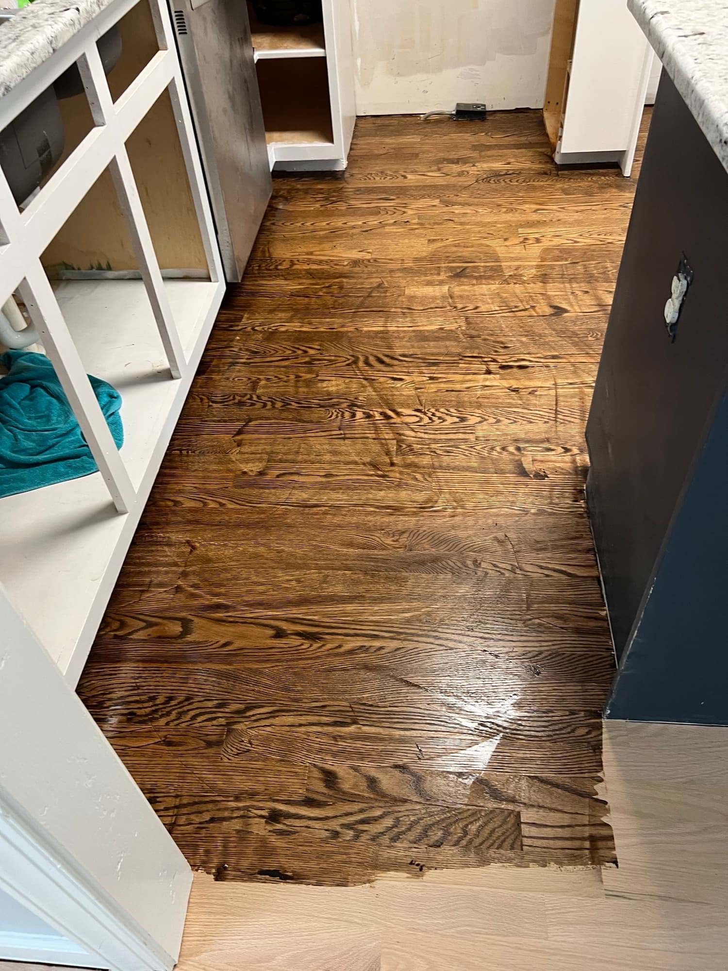 Rubio Monocoat oil being applied to new red oak floor in downtown Smithfield NC