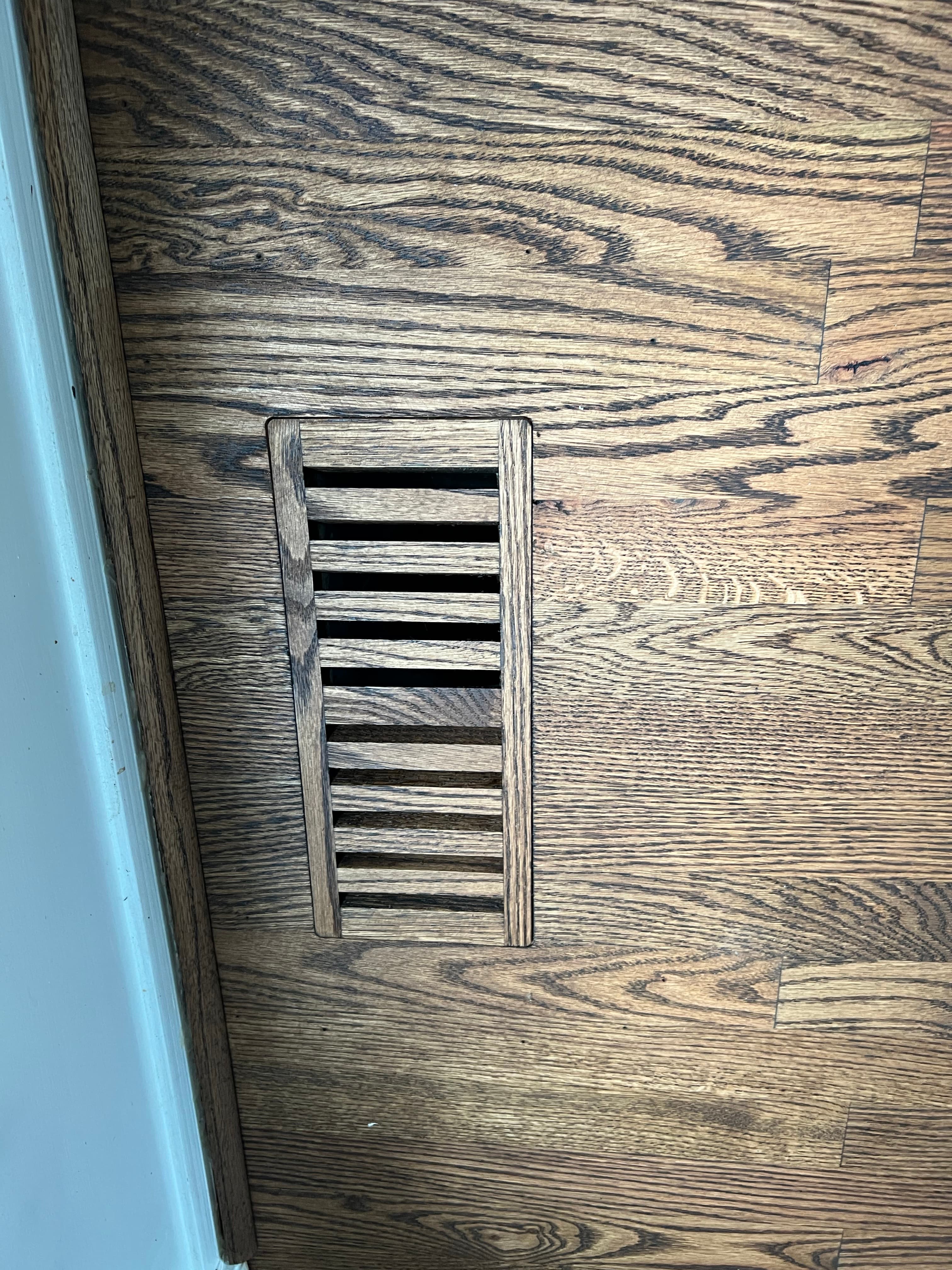 Flush mount floor vent installation in new red oak hardwood floor in Smithfield NC