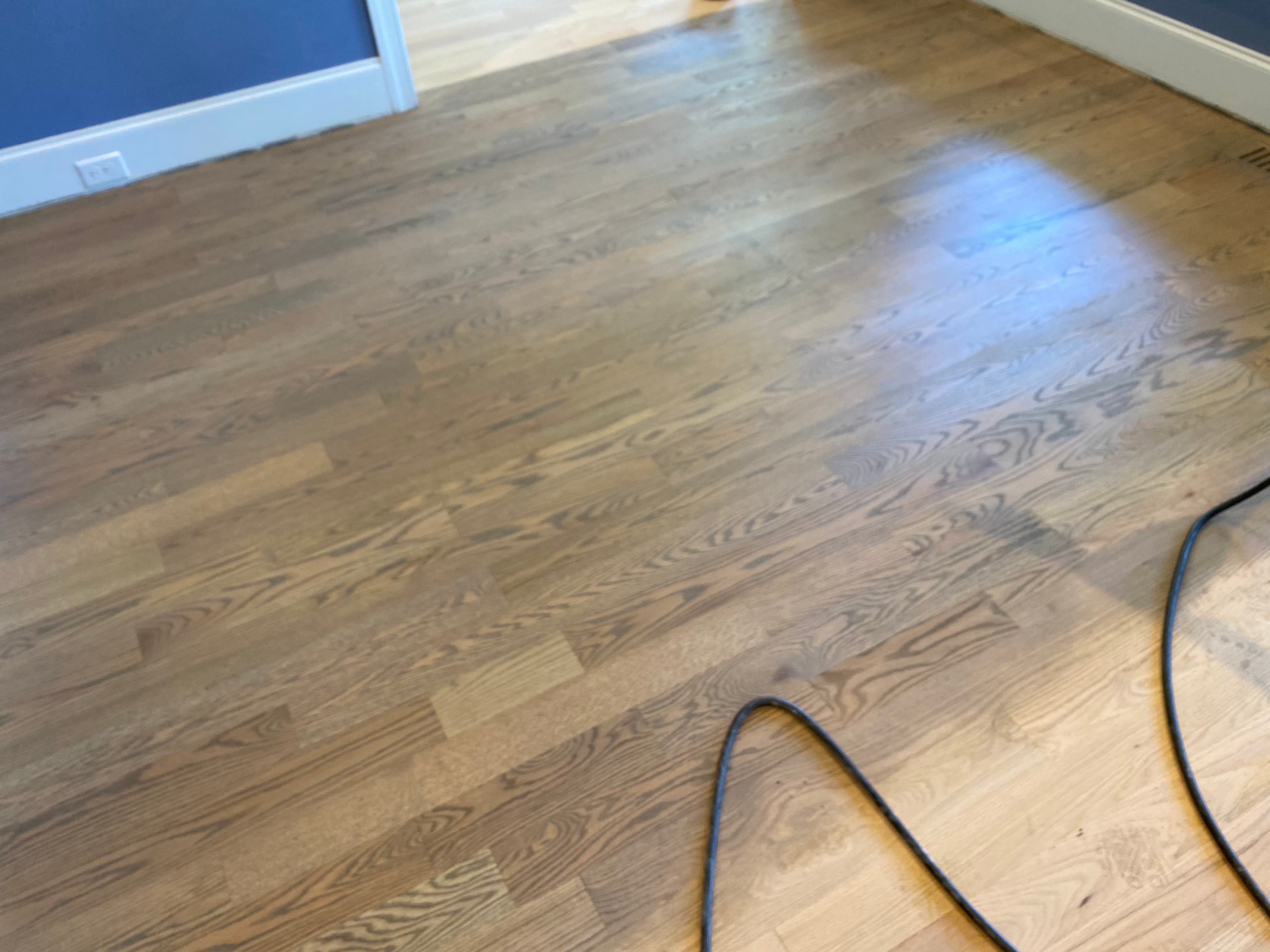 DuraSeal Aged Barrel stain being applied to red oak floors in Turner Downs Raleigh NC