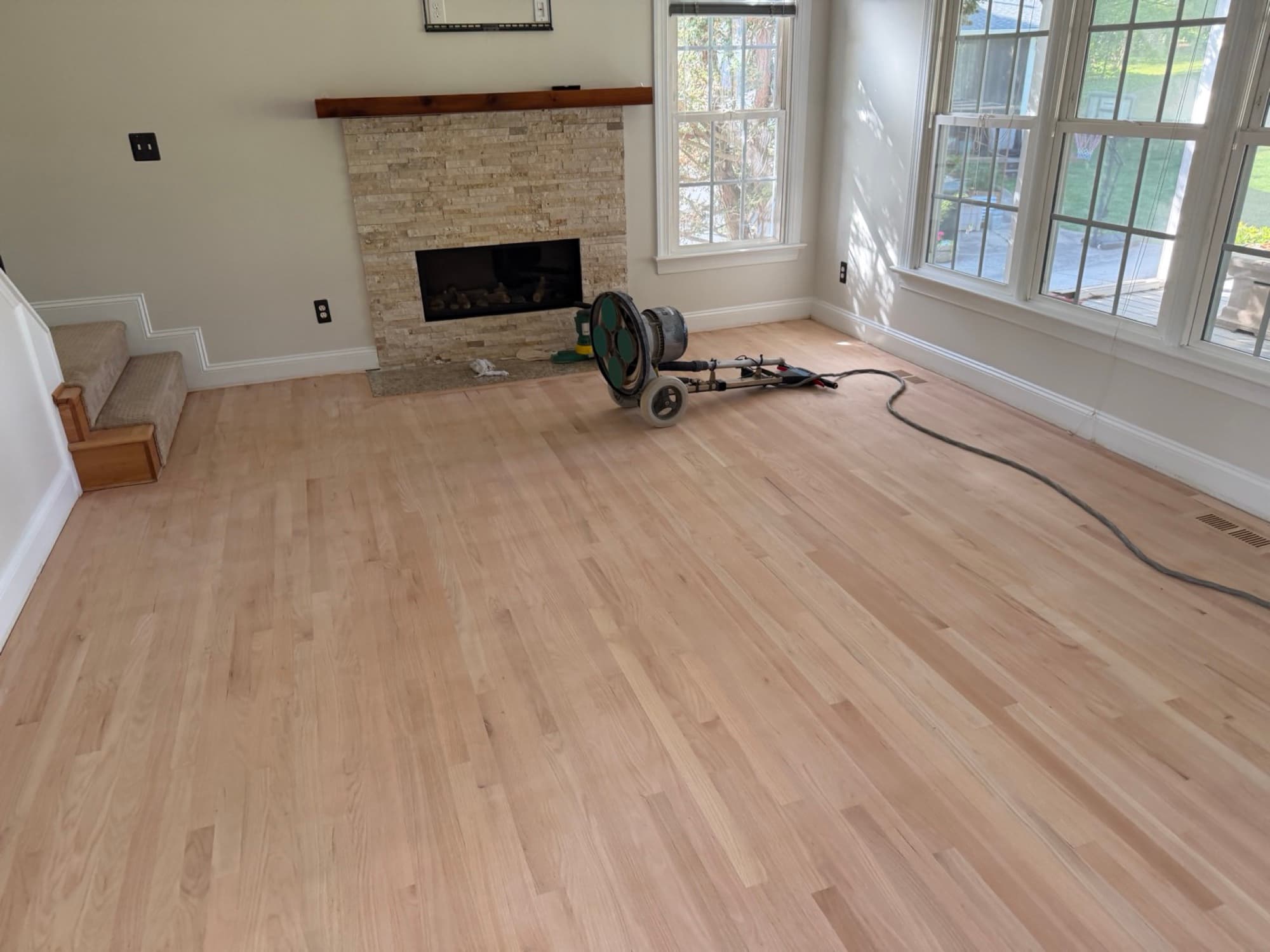 Bona PowerDrive planetary sander on red oak floors mid-refinish in Glen Laurel Clayton NC