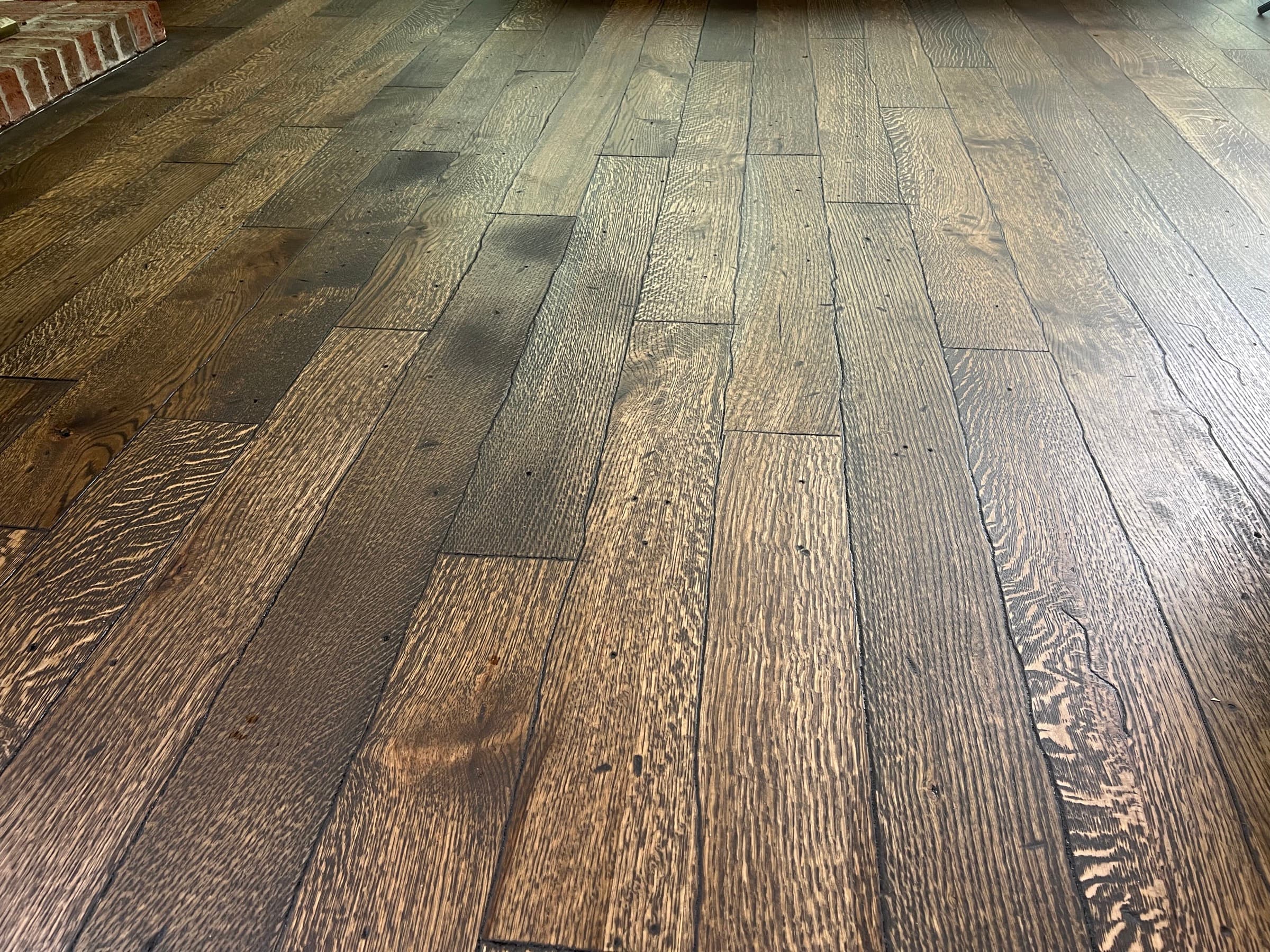 Wide plank rift and quartered white oak floor with custom buttery matte hardwax oil finish in Wendell Falls NC