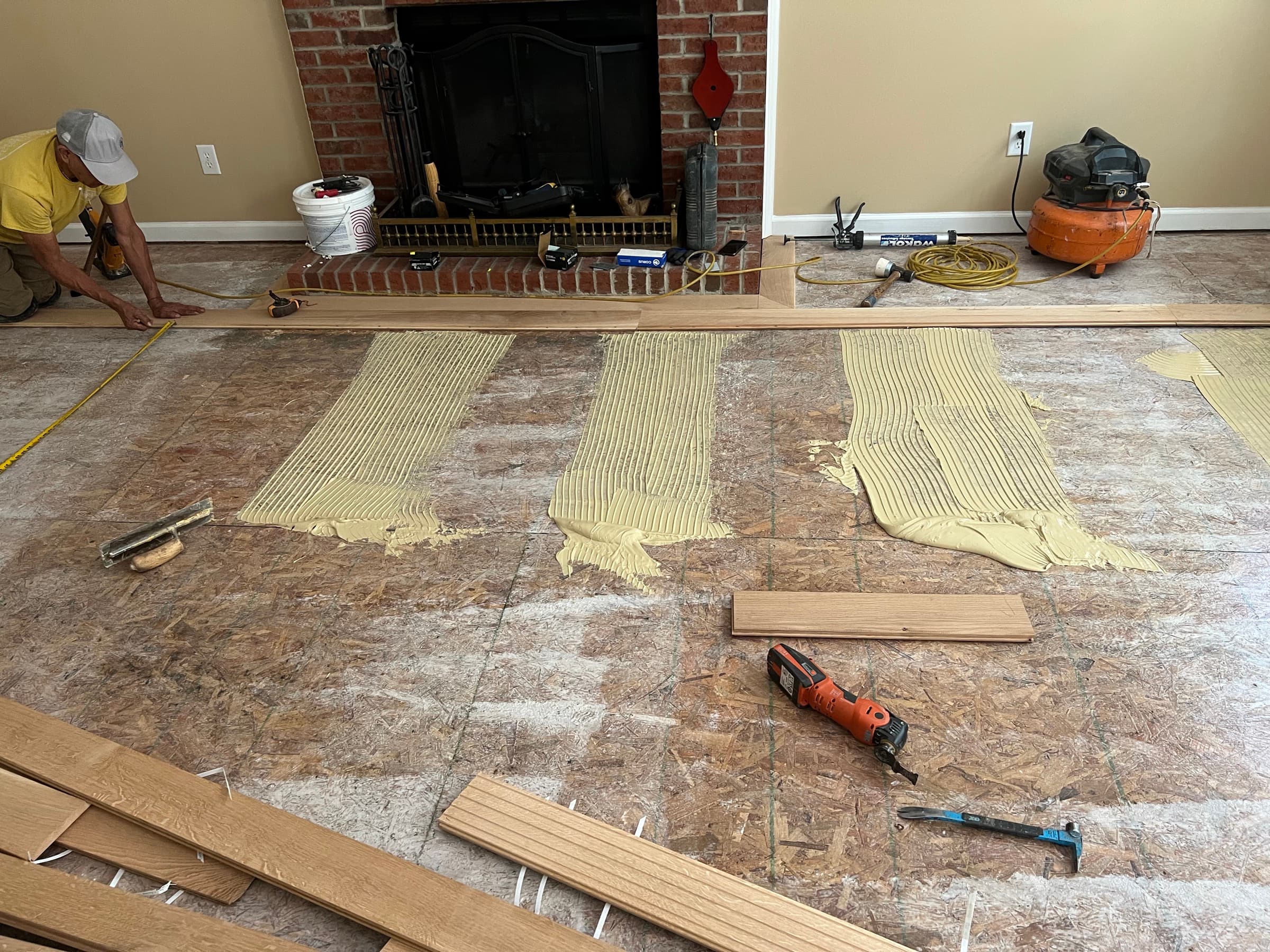 5 inch rift and quartered white oak installation with glue assist and roll-on moisture barrier in Wendell NC Westlake