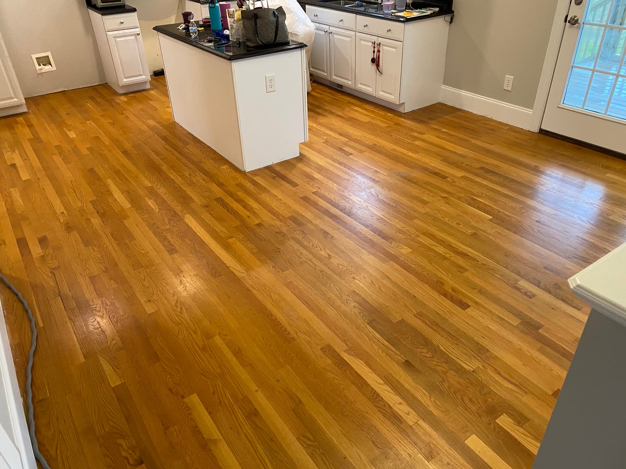Kitchen area white oak floors finished with Bona Craft Oil Frost in Heritage Wake Forest NC