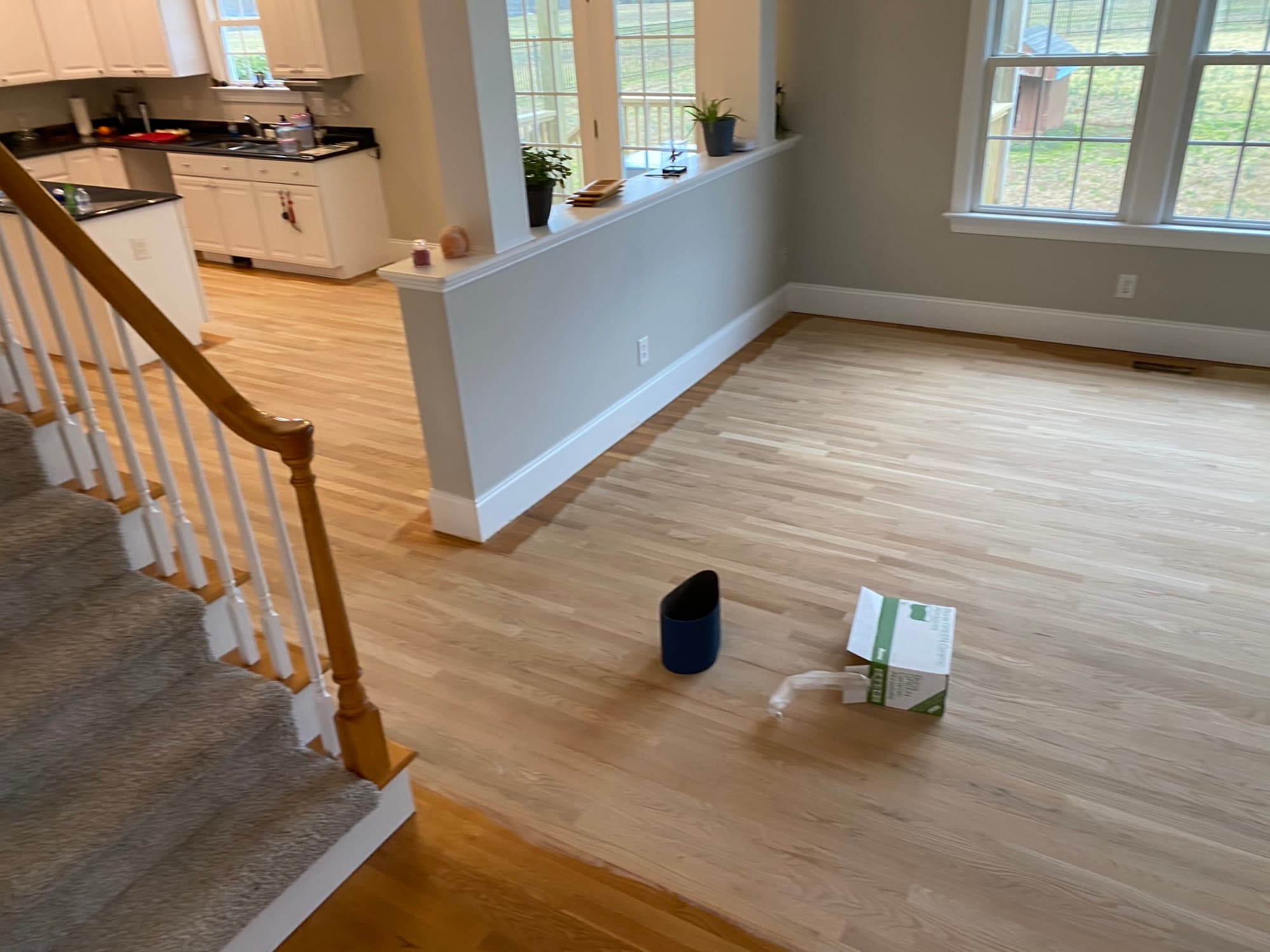 First cut sanding pass on white oak floor in Heritage Wake Forest NC revealing bare wood