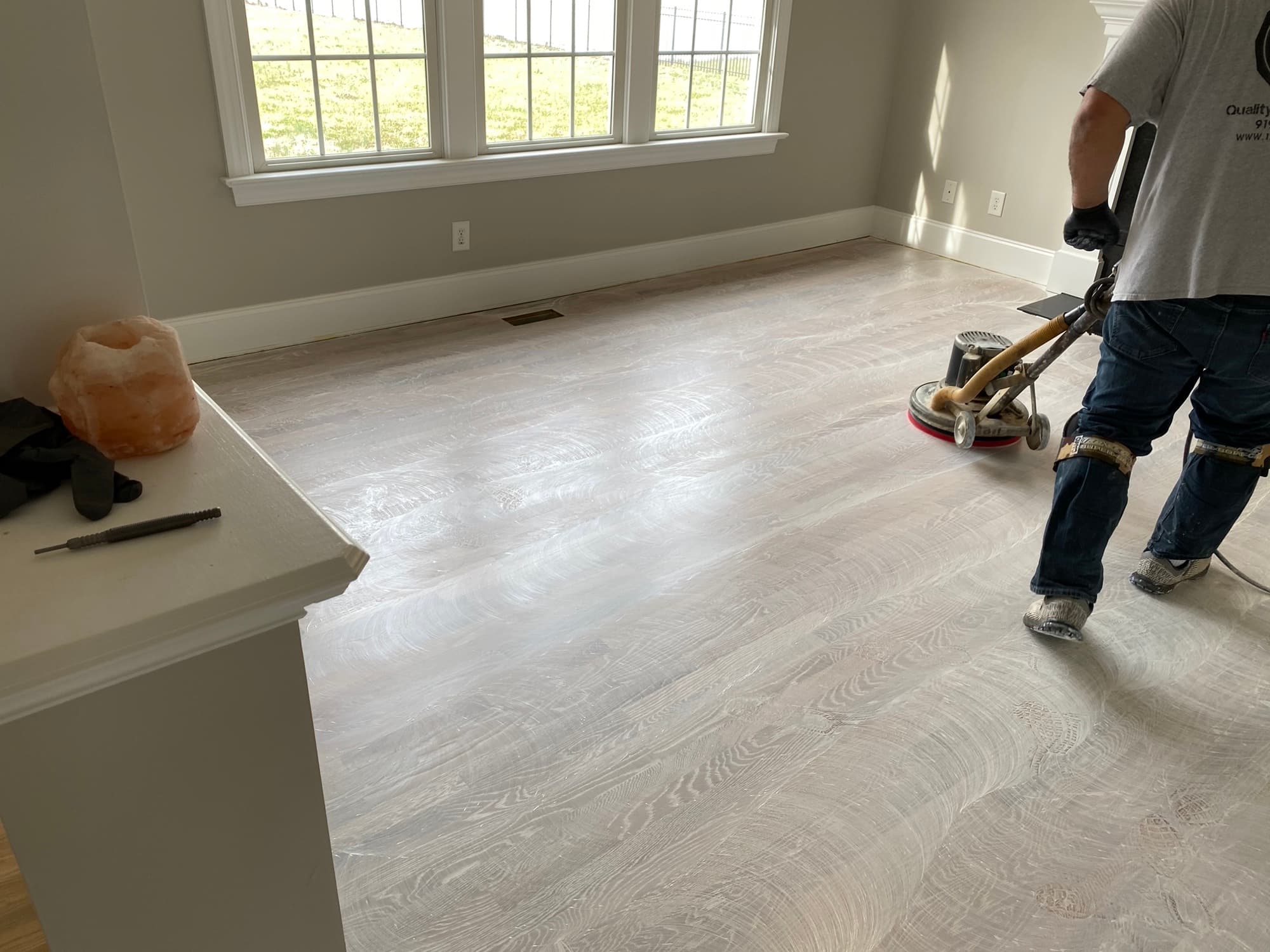 Applying Bona Craft Oil Frost to white oak floor in Heritage Wake Forest NC