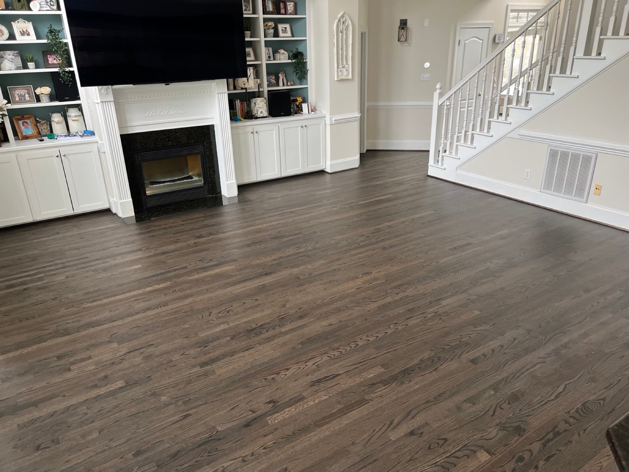 Dark stained hardwood floor living room reviewed by Raleigh NC homeowner