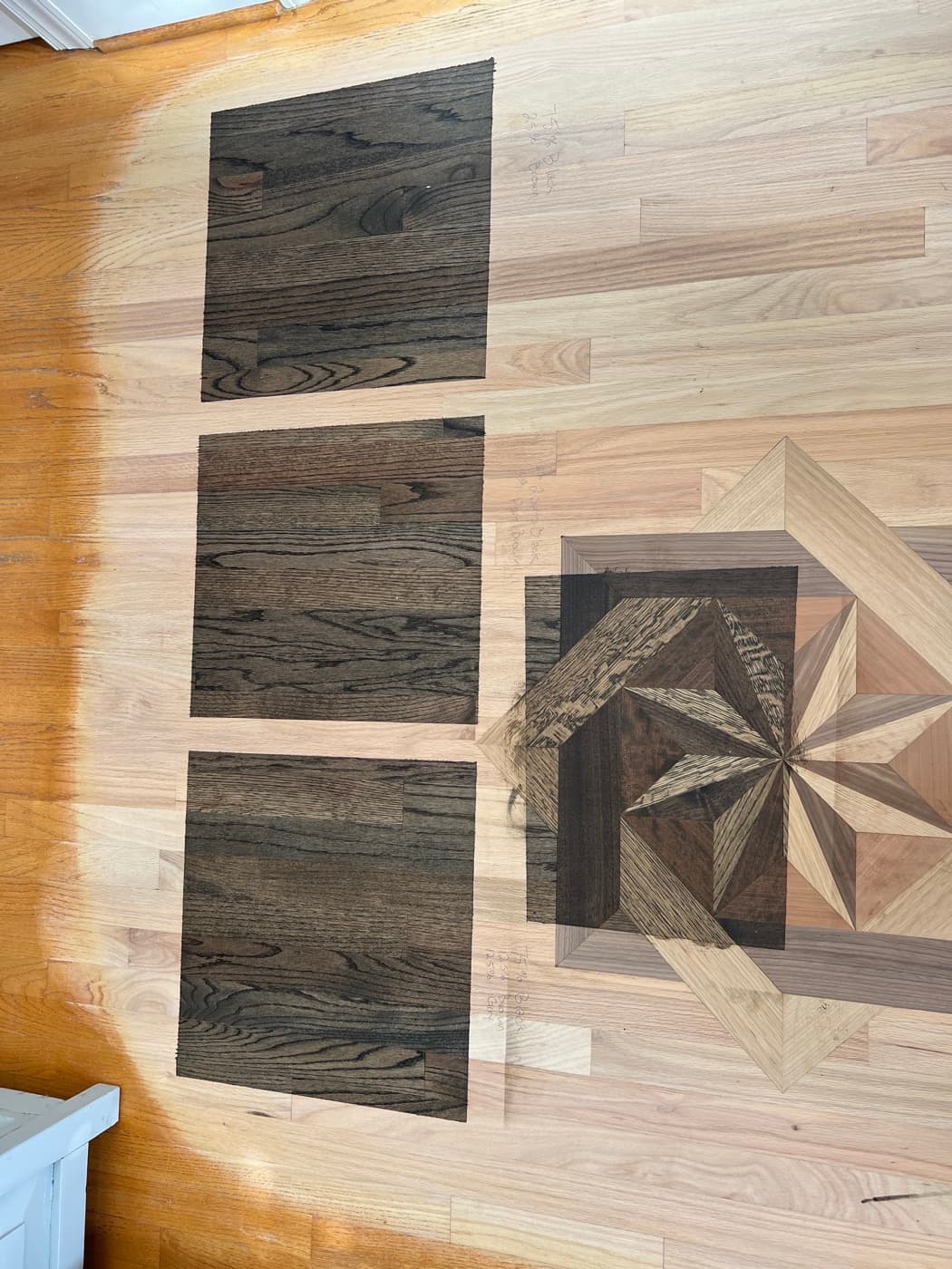 Three custom dark hardwax oil blends on white oak showing varying ratios of black, brown, and gray